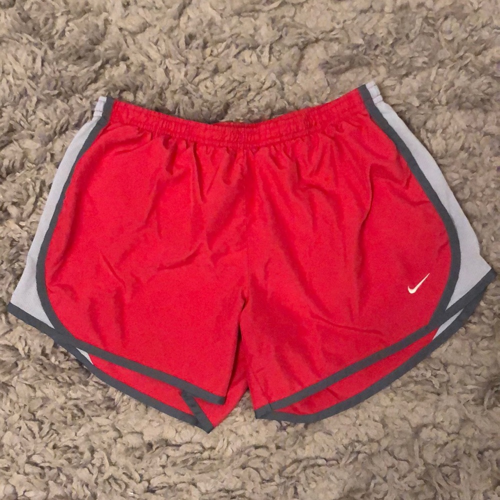 nike dri fit tempo shorts pink and white